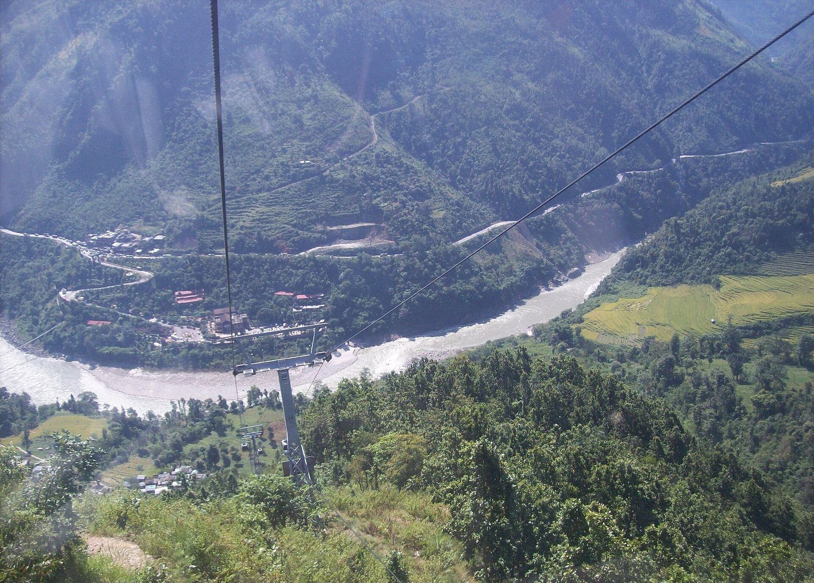 An aerial view of the Trishuli River winding below the Prithvi Highway near Mugling in Nepal's hill country.
