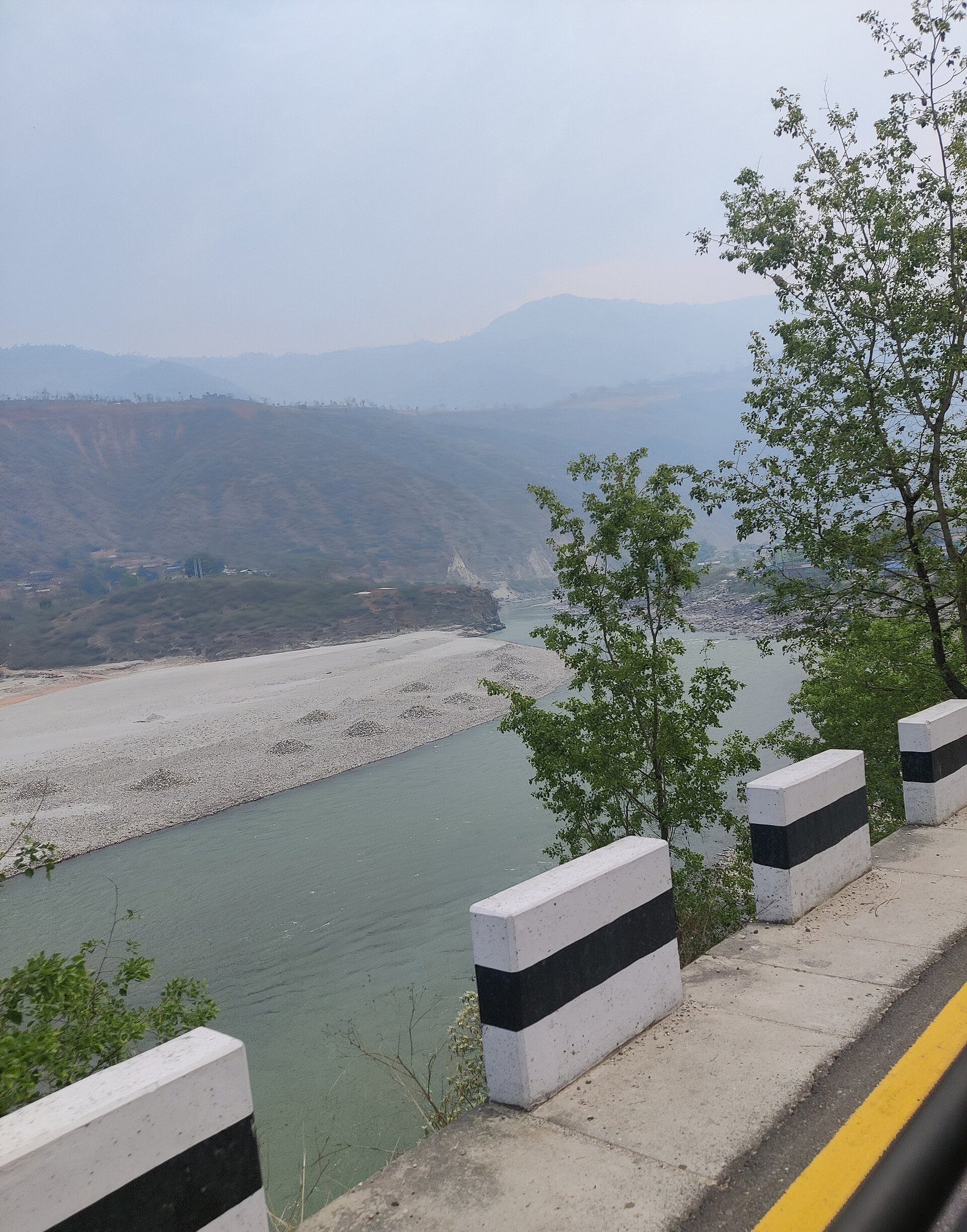 The Sunkoshi River winding below the BP Highway through the hills of Sindhuli district, Nepal.